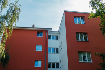 red and white facaded apartment building