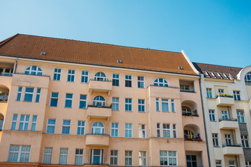 big orange apartment house