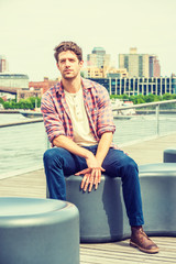 Fototapeta premium Young American man traveling, relaxing in New York