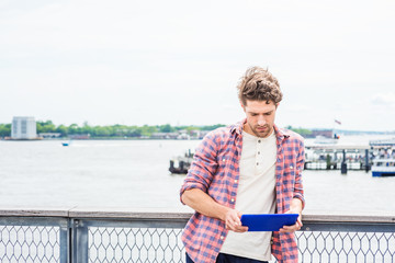 Fototapeta premium Young American man traveling, relaxing in New York