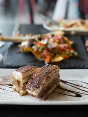 Tiramisu Served with Chocolate Sauce