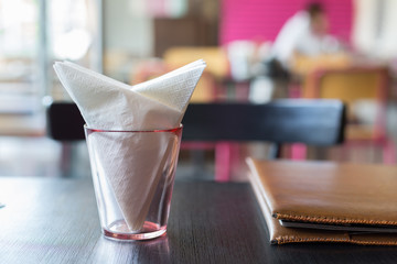 Paper Napkins in Pink Clear Glass on Table in Restaurant