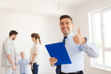 realtor with clipboard showing thumbs up - obrazy, fototapety, plakaty
