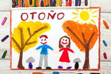 Obraz na płótnie Canvas Photo of colorful drawing: Spanish word AUTUMN, smiling couple and trees with yellow and orange trees.