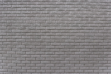 Old grey brick wall background