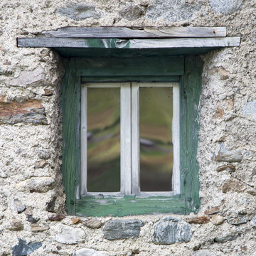Fototapeta Wall with window in wooden frame