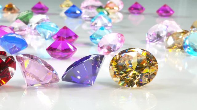 Blue Diamond,tourmaline pink,Amethyst Purple,Citrine Yellow,Iolite smokey blue,
Topaz lighter blue,Peridot green,and colorful gems in white background.
