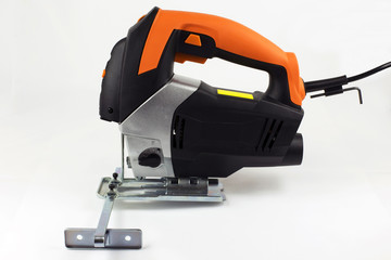 Fototapeta premium Electric jig saw on the light background