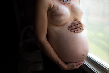 Pregnant breast cancer survivor with double mastectomy