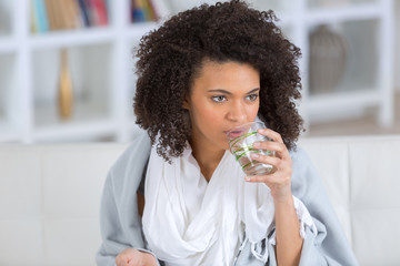 young woman drinking glass of water