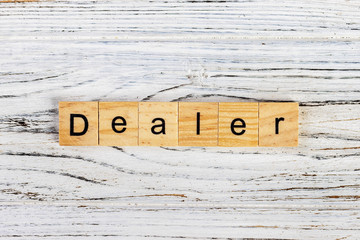 DEALER word made with building blocks concept.