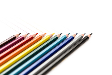 Colored pencils on white background