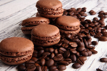 Sweet and colourful french macaroons or macaron with coffee