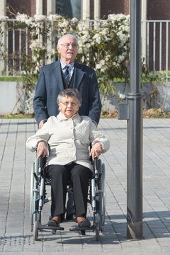 lovely retired couple woking in town