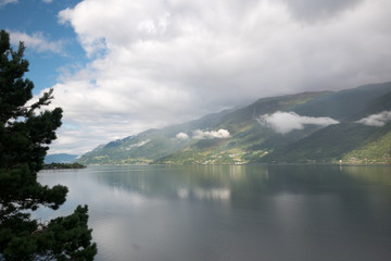 Clouds and water view on the narrowest fjord in Norway