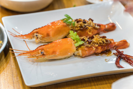 Deep fried prawns in tamarind sauce with herb