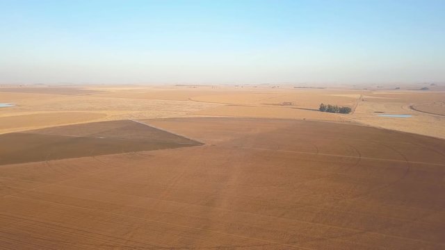 Fast flight over circular field in the dry season South Africa