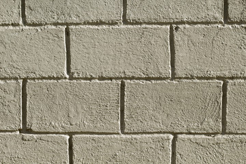 Fototapeta premium Concrete brick wall photo background. Rough grey stone bricks design.