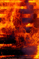 great burning bonfire made of logs with beautiful flames.