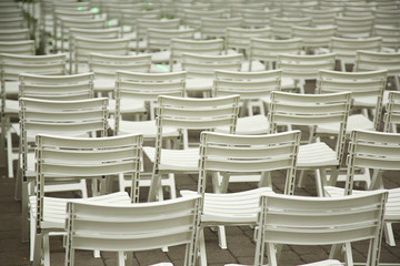 Row of chairs in park