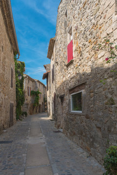 Aigueze in Ardeche, most beautiful french village, old houses and pavement
