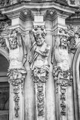 Sculptural group, details. Architecture of Dresden, Germany. Black and white photo