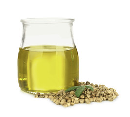 Hemp oil in glass jar isolated on white