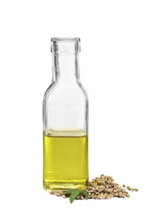 Glass bottle with hemp oil isolated on white