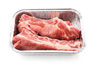 Container with fresh meat, isolated on white