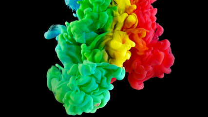 Colorful rainbow paint drops from above mixing in water. Ink swirling underwater. Cloud of ink isolated on black background. Colored abstract smoke explosion effect. Close up view