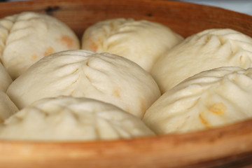 Korean delicious steamed dumplings in bamboo basket