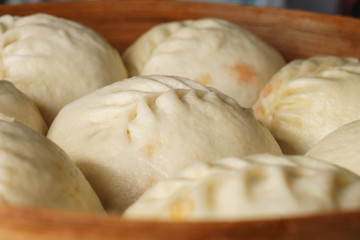 Korean delicious steamed dumplings in bamboo basket