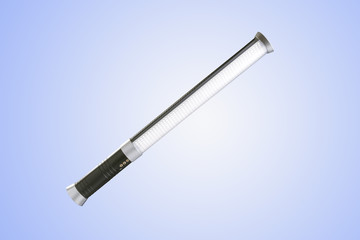 Portable magic tube LED lightisolated on blue background