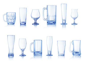 Collection of different beer glasses isolated on white