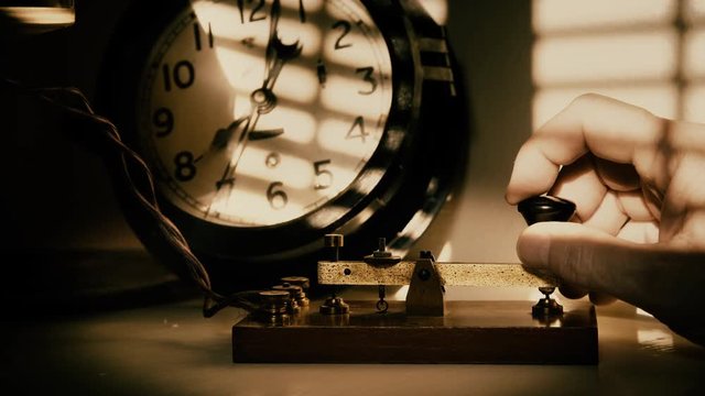 A ships telegrapher sending out morse code messages 4k