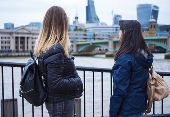 Two girls visit London and enjoy the trip and sightseeing
