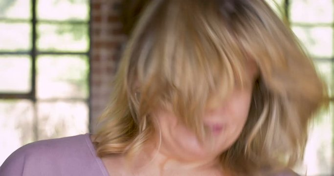 Tired overworked woman nodding off to sleep from exhaustion or narcolepsy