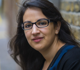 Young woman smiles at the camera