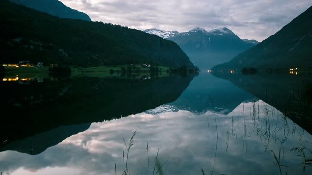 Amaizing time-lapse of night to day in Mindresunde Camping Norway with foggy morning