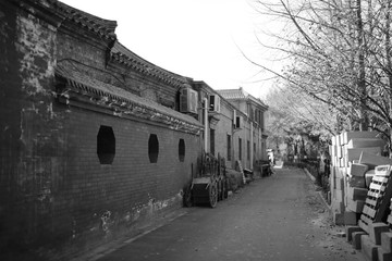 Medieval street in old town in black and white.