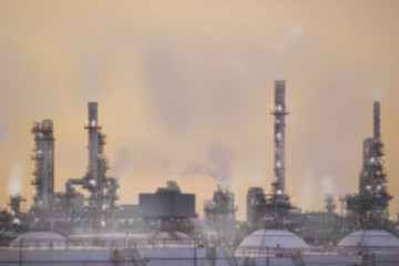 Abstract blurred oil refinery pollution background.