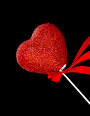 Valentine's day red heart on a black background