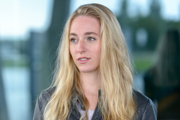 Portrait of young blond long-haired woman
