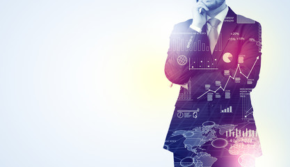 Man standing with graphs on the background