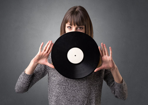 Lady holding vinyl record