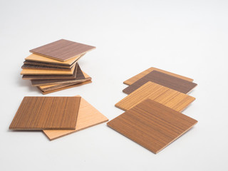 Naklejka na ściany i meble Samples of veneer wood on white background. interior design select material for idea.