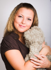 Girl with a teddy bear