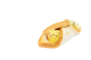 Sausage wrapped in egg bread (sandwich) with mayonnaise sauce and sprinkle little dried oregano isolated on white background - homemade food concept.