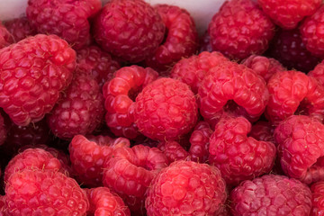Fresh raspberries on a market