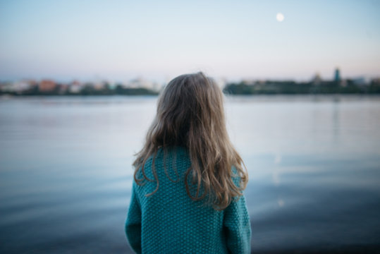 girl on the river evening watching moon